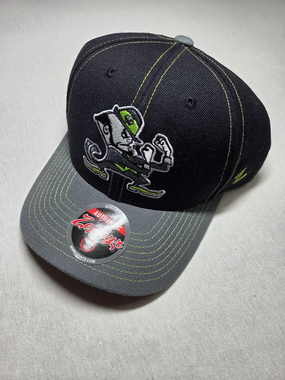 Black and Grey Notre Dame Fighting Irish snapback cap by Zephyr Brand New OS